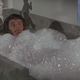 Zira takes a bubble bath.